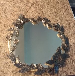 Anthropology round mirror with metal flowers